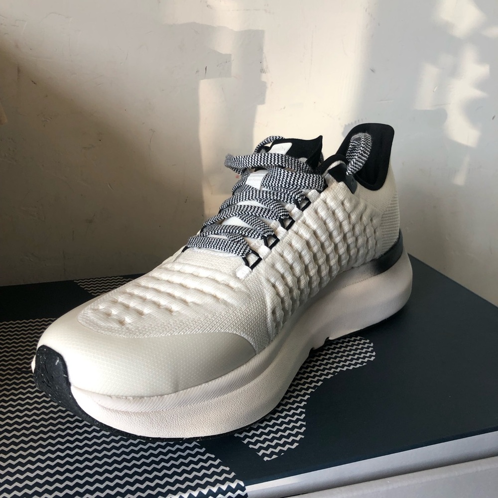 TaskRabbit Sleek White and Black Textured Sneakers